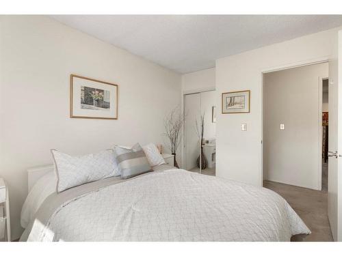 143 Brookgreen Drive Sw, Calgary, AB - Indoor Photo Showing Bedroom