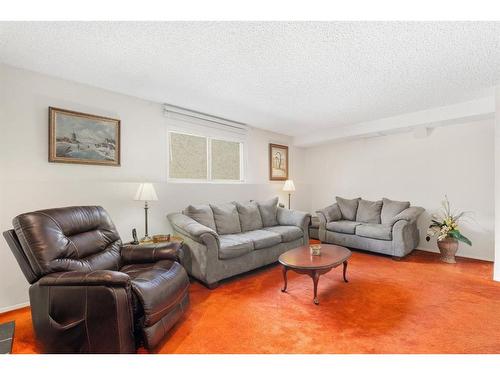 143 Brookgreen Drive Sw, Calgary, AB - Indoor Photo Showing Living Room