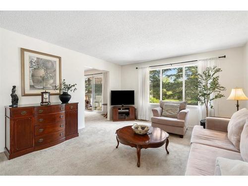 143 Brookgreen Drive Sw, Calgary, AB - Indoor Photo Showing Living Room