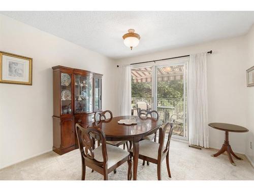 143 Brookgreen Drive Sw, Calgary, AB - Indoor Photo Showing Dining Room