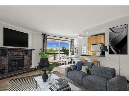 401-409 1 Avenue Ne, Calgary, AB - Indoor Photo Showing Living Room With Fireplace