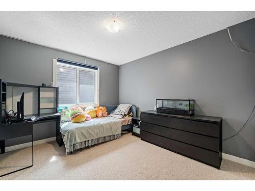 107 Cranwell Square Se, Calgary, AB - Indoor Photo Showing Bedroom