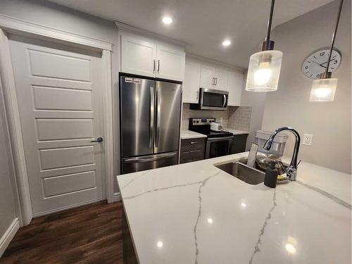 233 Savanna Ne, Calgary, AB - Indoor Photo Showing Kitchen With Stainless Steel Kitchen With Upgraded Kitchen