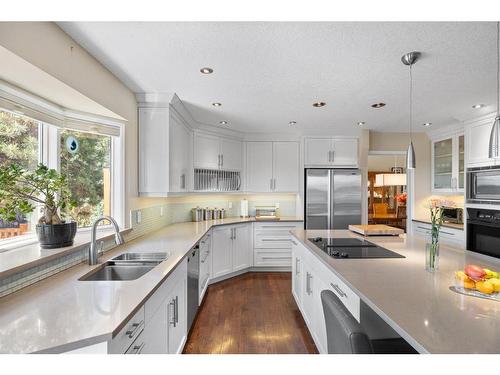 235 Woodfield Road Sw, Calgary, AB - Indoor Photo Showing Kitchen With Stainless Steel Kitchen With Double Sink With Upgraded Kitchen