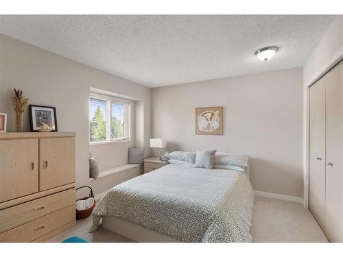 235 Woodfield Road Sw, Calgary, AB - Indoor Photo Showing Bedroom