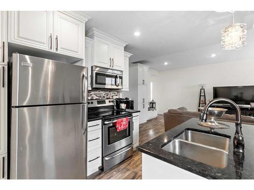 15 Keown Close, Olds, AB - Indoor Photo Showing Kitchen With Double Sink