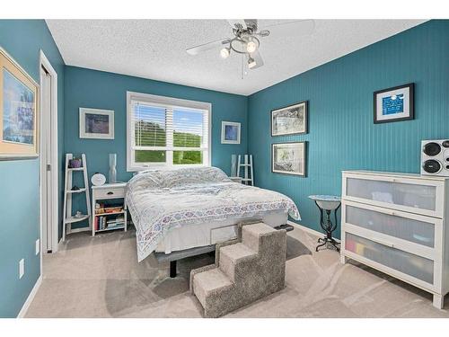 163 Hawkcliff Way Nw, Calgary, AB - Indoor Photo Showing Bedroom