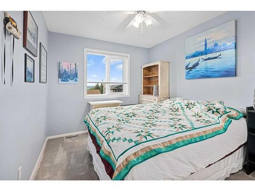 163 Hawkcliff Way Nw, Calgary, AB - Indoor Photo Showing Bedroom