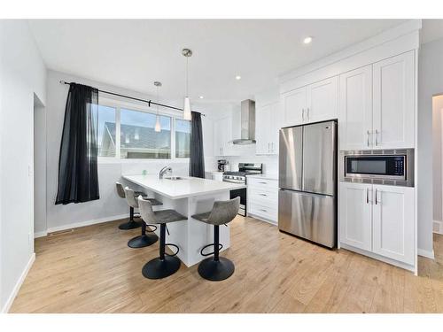 25 Lucas Rise Nw, Calgary, AB - Indoor Photo Showing Kitchen With Stainless Steel Kitchen With Upgraded Kitchen