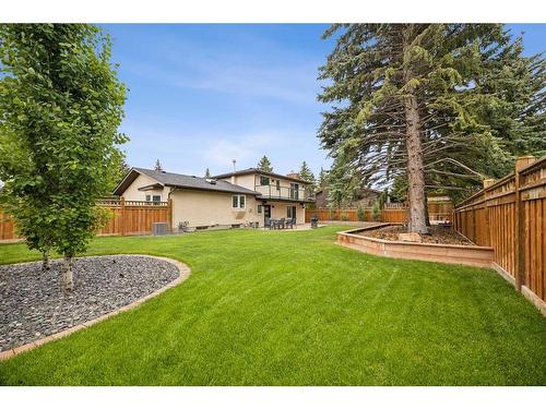 260 Pump Hill Crescent Sw, Calgary, AB - Outdoor With Backyard