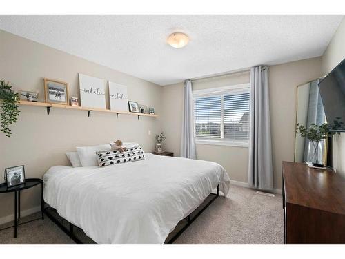 295 Creekstone Way Sw, Calgary, AB - Indoor Photo Showing Bedroom