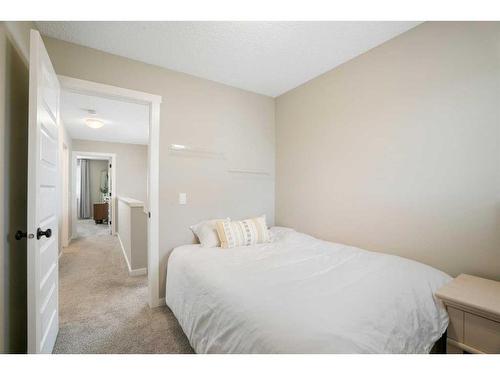 295 Creekstone Way Sw, Calgary, AB - Indoor Photo Showing Bedroom