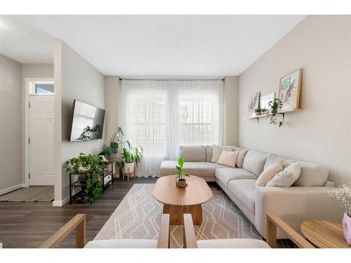 295 Creekstone Way Sw, Calgary, AB - Indoor Photo Showing Living Room