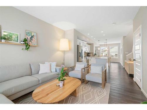 295 Creekstone Way Sw, Calgary, AB - Indoor Photo Showing Living Room