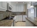 355 34 Avenue Ne, Calgary, AB  - Indoor Photo Showing Kitchen With Double Sink 