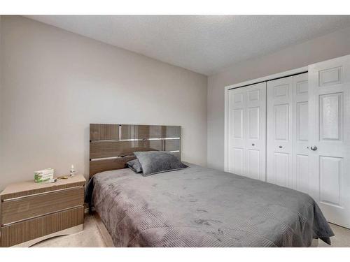803 Taradale Drive Ne, Calgary, AB - Indoor Photo Showing Bedroom