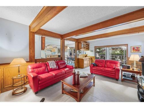 672 Coach Grove Road Sw, Calgary, AB - Indoor Photo Showing Living Room