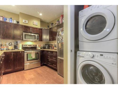 410-1899 45 Street Nw, Calgary, AB - Indoor Photo Showing Laundry Room