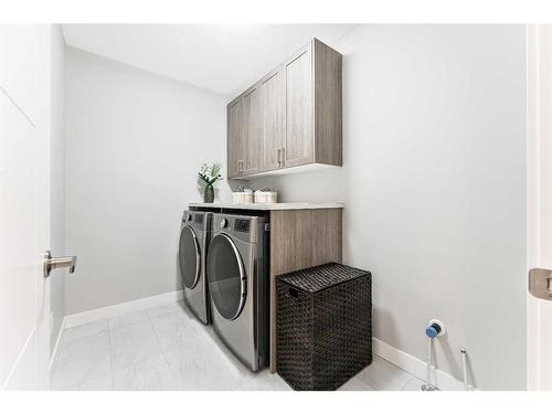 113 Amblehurst Green Nw, Calgary, AB - Indoor Photo Showing Laundry Room