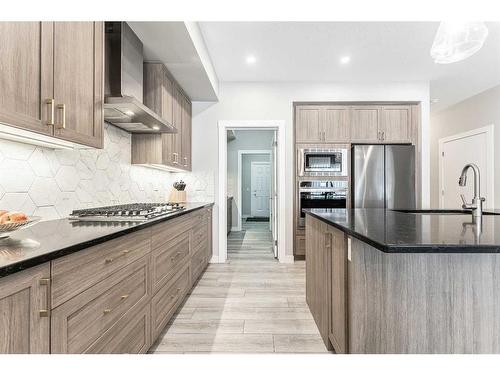 113 Amblehurst Green Nw, Calgary, AB - Indoor Photo Showing Kitchen With Upgraded Kitchen