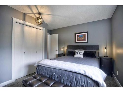 199 Riverside Close Se, Calgary, AB - Indoor Photo Showing Bedroom