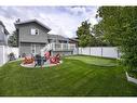 199 Riverside Close Se, Calgary, AB  - Outdoor With Deck Patio Veranda With Backyard 