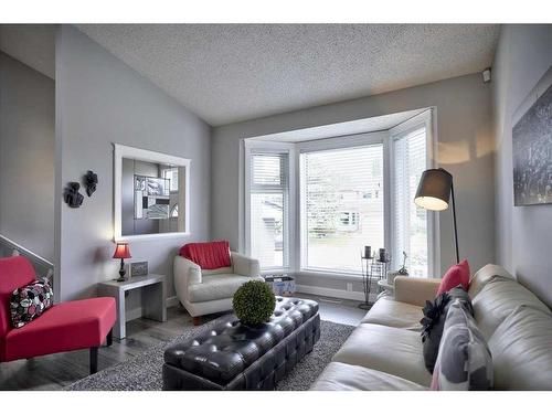 199 Riverside Close Se, Calgary, AB - Indoor Photo Showing Living Room