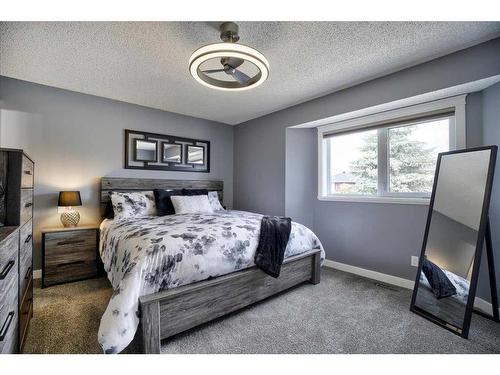 199 Riverside Close Se, Calgary, AB - Indoor Photo Showing Bedroom