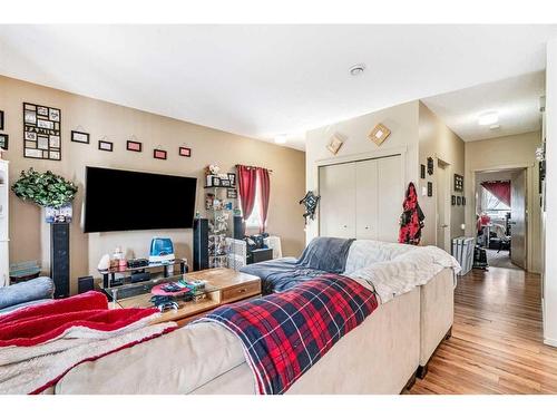 147-300 Evanscreek Court Nw, Calgary, AB - Indoor Photo Showing Living Room With Fireplace