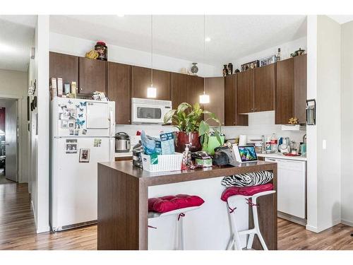 147-300 Evanscreek Court Nw, Calgary, AB - Indoor Photo Showing Kitchen