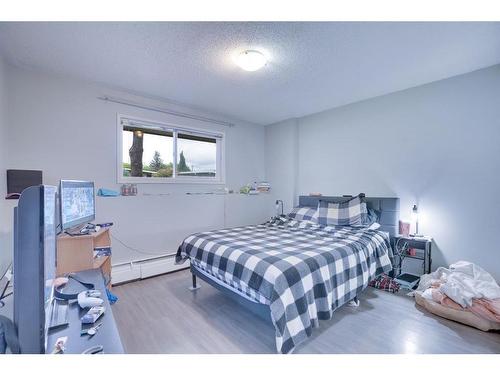 #104-617 56 Avenue Sw, Calgary, AB - Indoor Photo Showing Bedroom