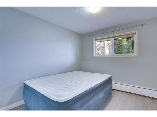 #104-617 56 Avenue Sw, Calgary, AB - Indoor Photo Showing Bedroom