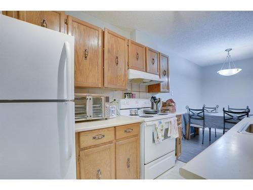 #104-617 56 Avenue Sw, Calgary, AB - Indoor Photo Showing Kitchen