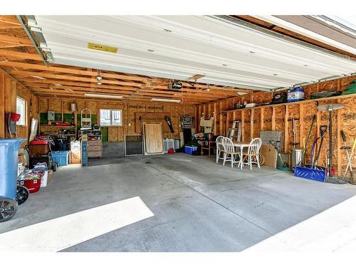 30 River Rock Way Se, Calgary, AB - Indoor Photo Showing Garage