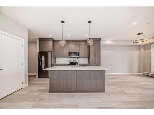 2201-681 Savanna Boulevard Ne, Calgary, AB - Indoor Photo Showing Kitchen