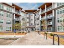 2201-681 Savanna Boulevard Ne, Calgary, AB  - Outdoor With Balcony With Facade 