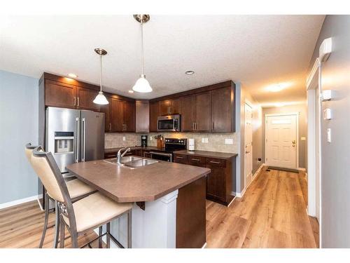 75 Chaparral Valley Gardens Se, Calgary, AB - Indoor Photo Showing Kitchen With Stainless Steel Kitchen With Double Sink