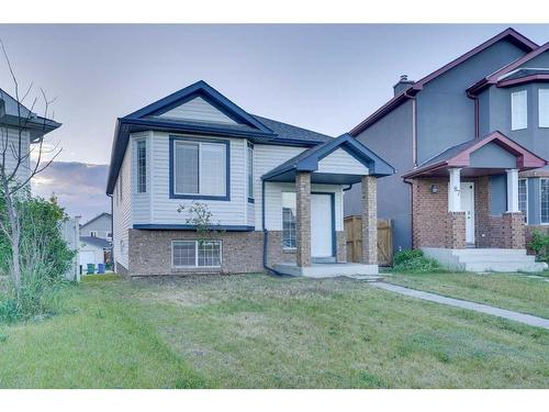 83 Saddlemont Manor Ne, Calgary, AB - Outdoor With Facade