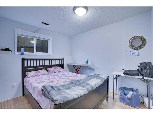 83 Saddlemont Manor Ne, Calgary, AB - Indoor Photo Showing Bedroom