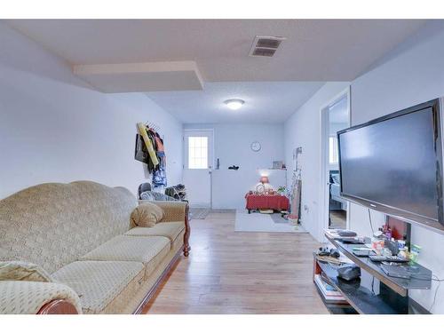 83 Saddlemont Manor Ne, Calgary, AB - Indoor Photo Showing Living Room