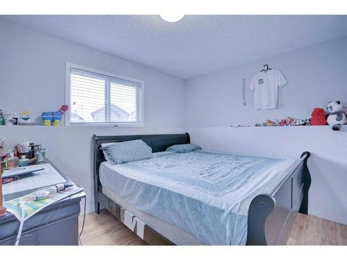83 Saddlemont Manor Ne, Calgary, AB - Indoor Photo Showing Bedroom