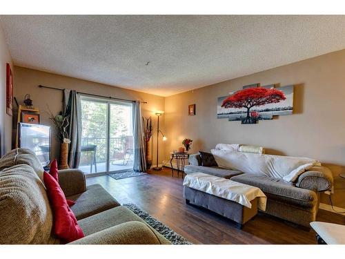 312-55 Arbour Grove Close Nw, Calgary, AB - Indoor Photo Showing Living Room