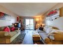 312-55 Arbour Grove Close Nw, Calgary, AB  - Indoor Photo Showing Living Room 