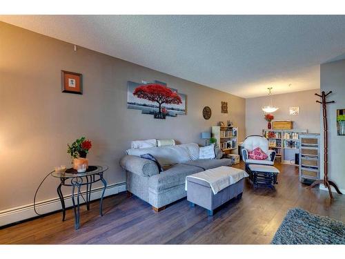 312-55 Arbour Grove Close Nw, Calgary, AB - Indoor Photo Showing Living Room