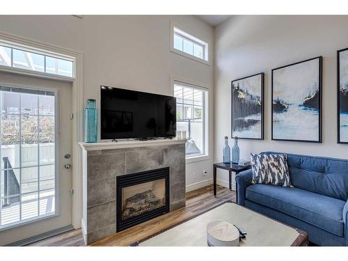 23 Royal Oak Plaza Nw, Calgary, AB - Indoor Photo Showing Living Room With Fireplace