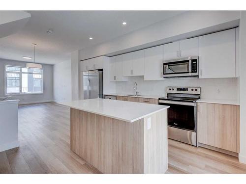 8528 19 Avenue Se, Calgary, AB - Indoor Photo Showing Kitchen With Stainless Steel Kitchen With Upgraded Kitchen
