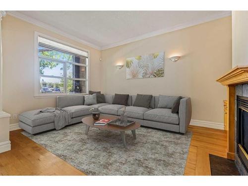 2138 1 Avenue Nw, Calgary, AB - Indoor Photo Showing Living Room With Fireplace