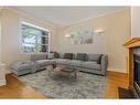 2138 1 Avenue Nw, Calgary, AB  - Indoor Photo Showing Living Room With Fireplace 