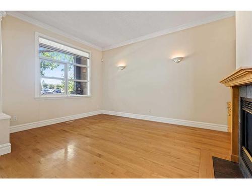 2138 1 Avenue Nw, Calgary, AB - Indoor Photo Showing Other Room With Fireplace