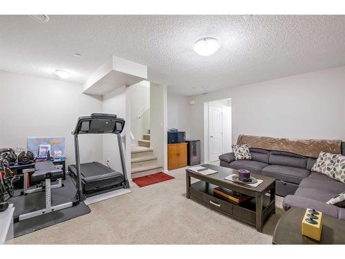 78 Livingston Gate Ne, Calgary, AB - Indoor Photo Showing Gym Room